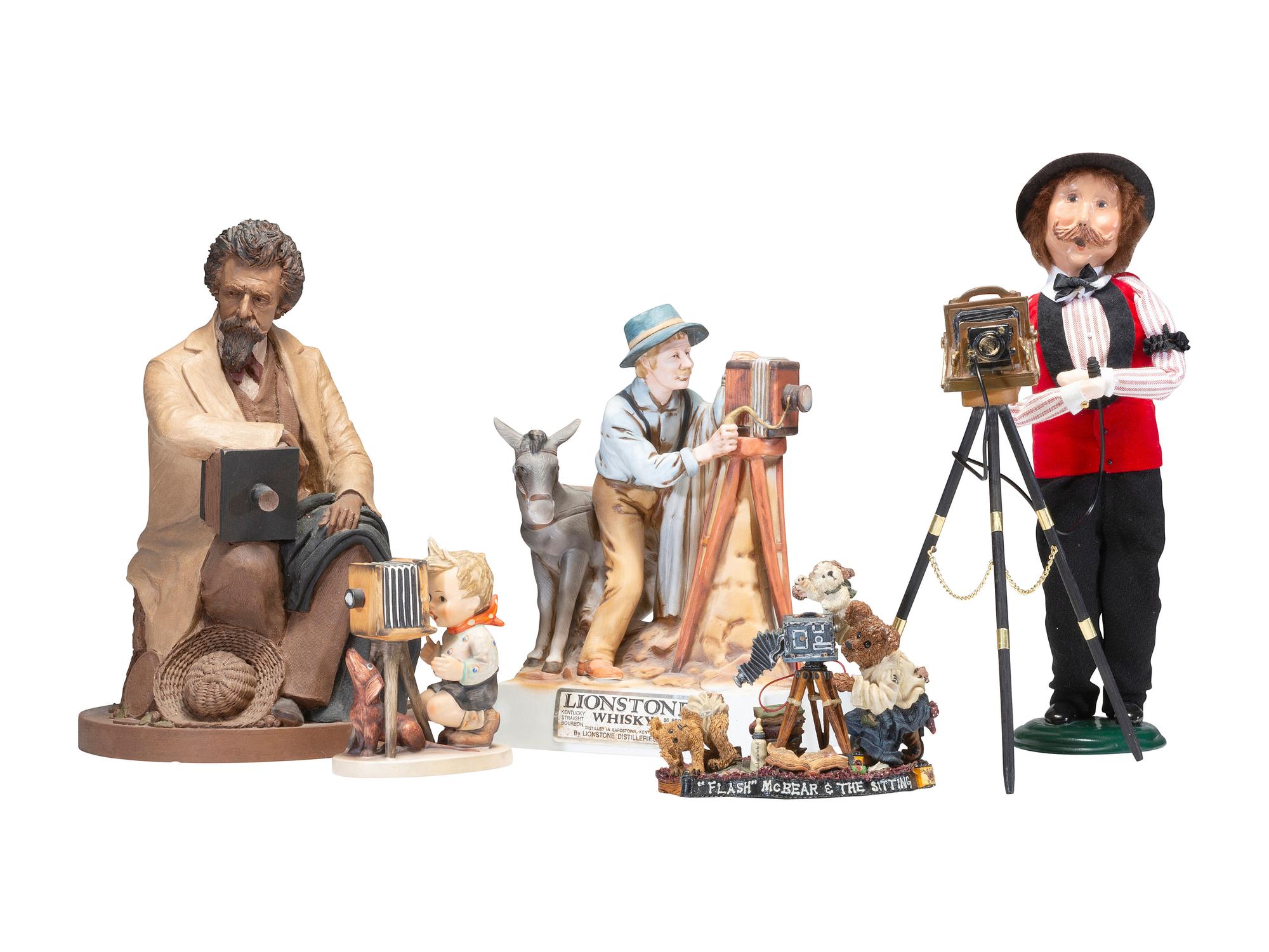 [PHOTOG.] Collectible prints and figures feat. cameras and photographers, incl. Brady and Jackson.