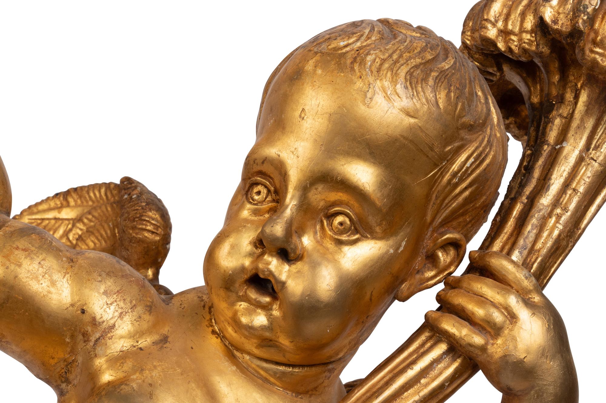 A Pair of Continental Giltwood Cherubs