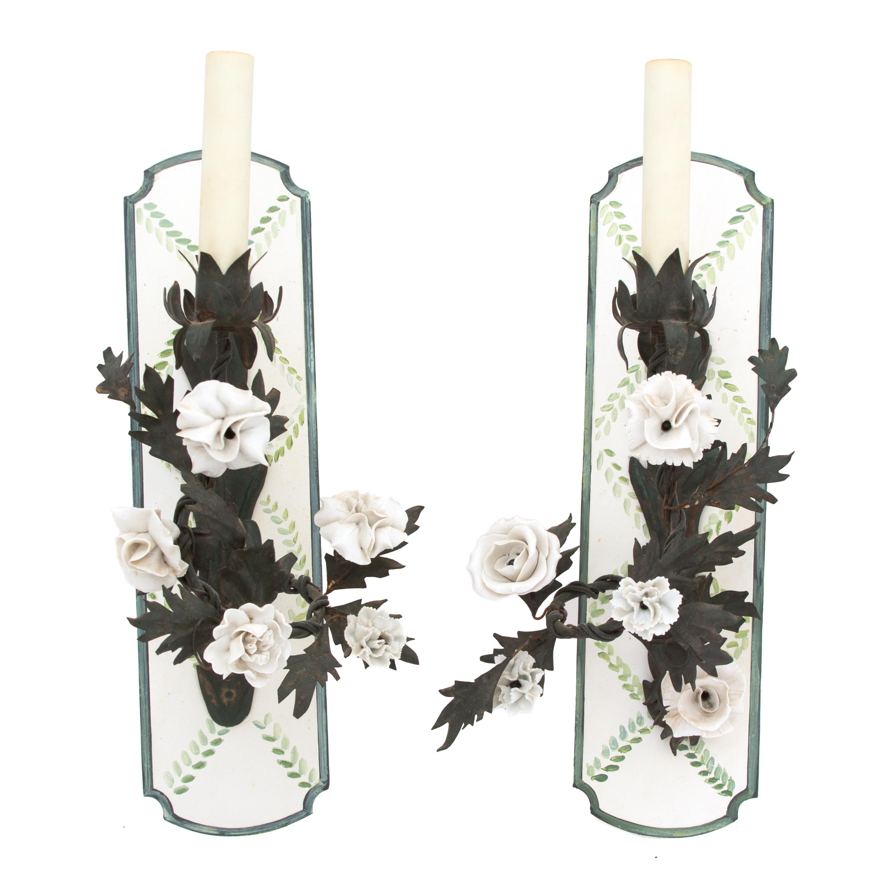 Two Pairs of Gilt Metal and Porcelain Flower Mounted Wall Sconces Height of taller 17 1/2 inches.
