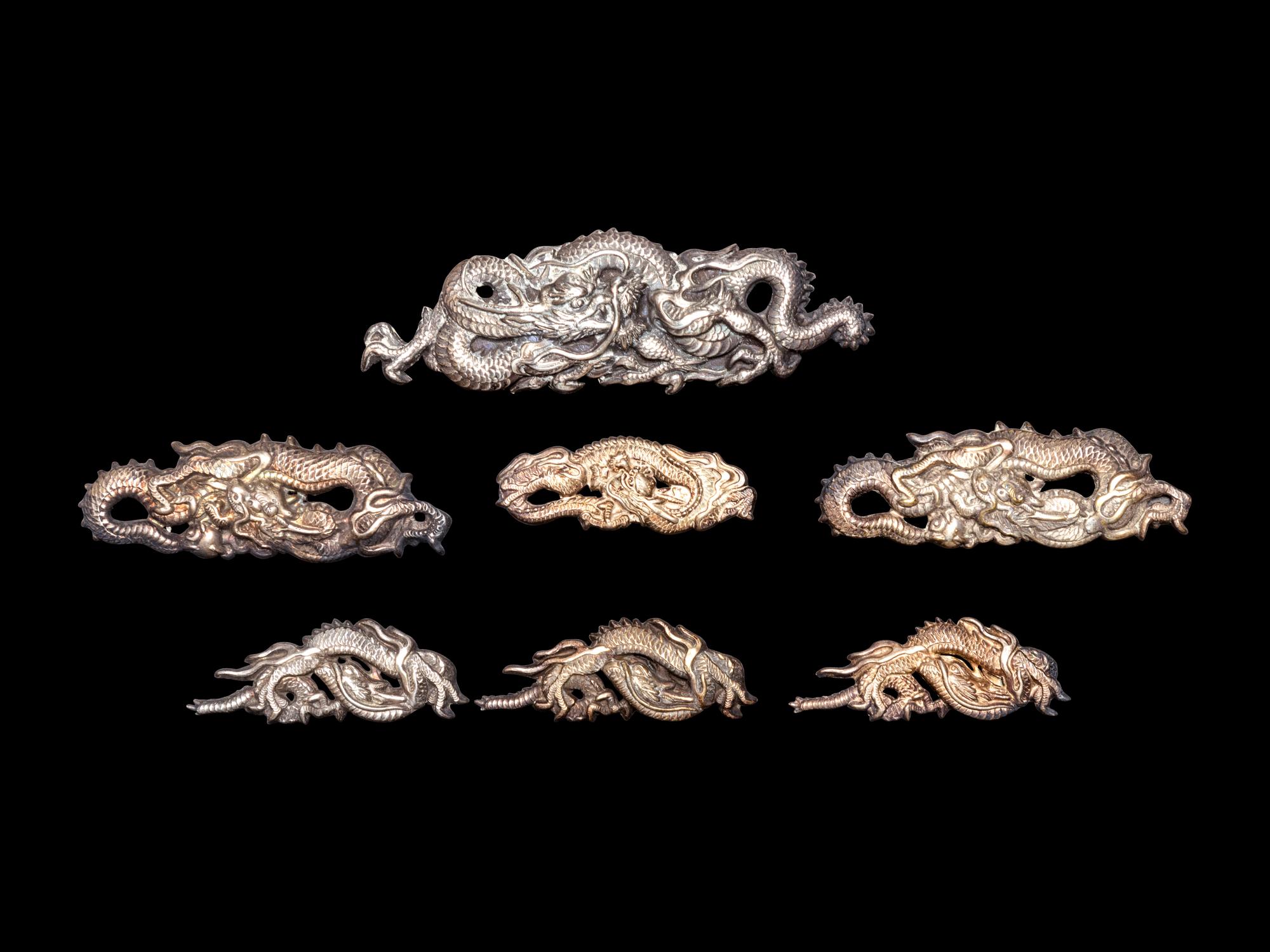 22 Mixed Metal Menuki and A Set of Menuki, Fuchi and Gashira