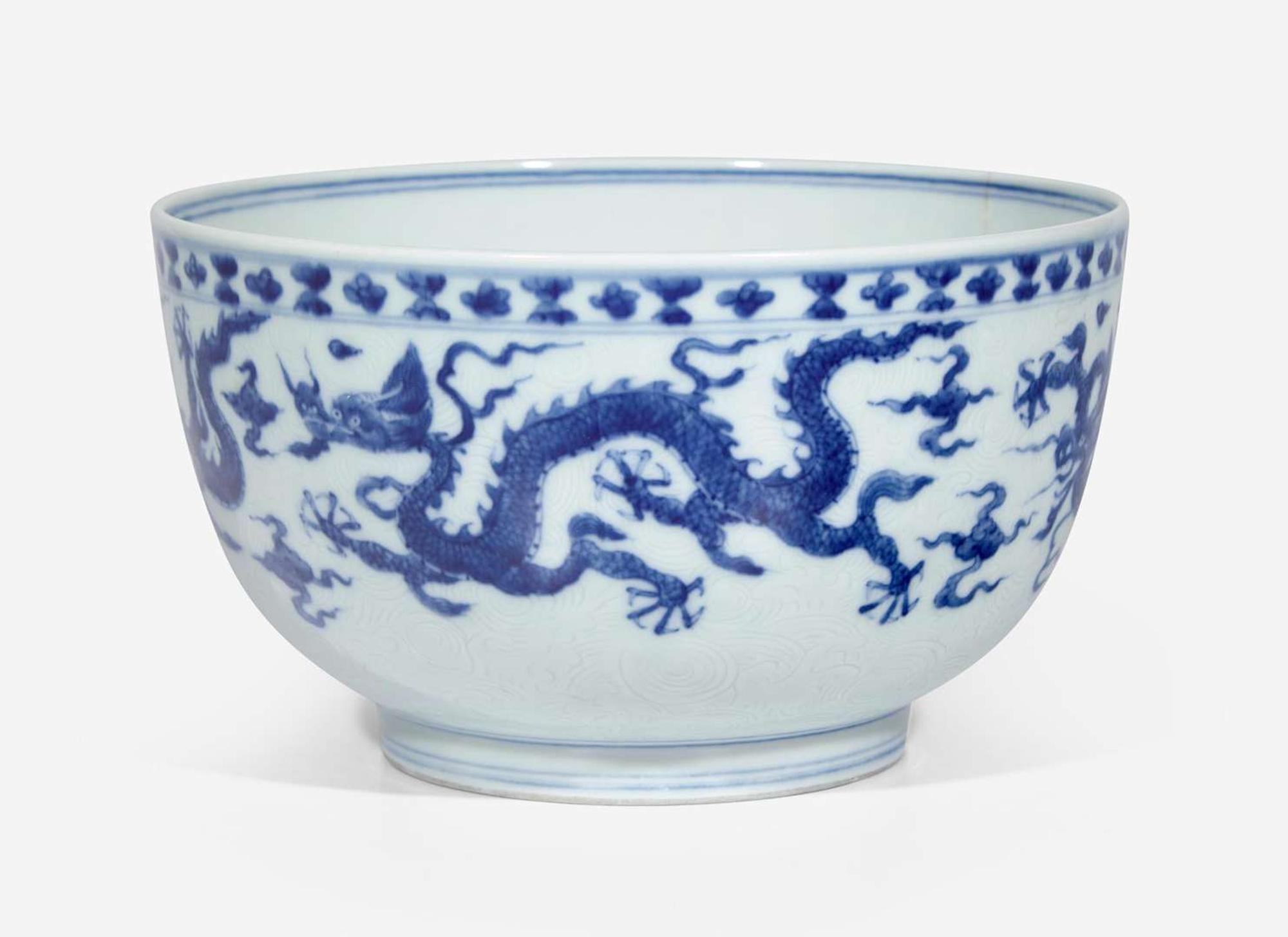 An unusual Chinese blue and white "Dragon" deep bowl, Zhengde mark, possibly 18th century 青花龍紋深腹盌 正德款 或十八世紀