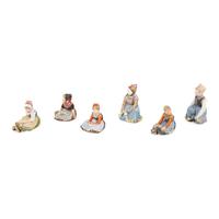 A Group of Six Royal Copenhagen Children of the Provinces Porcelain Figures