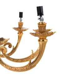 A Pair of Empire Style Gilt Bronze Nine-Light Chandeliers