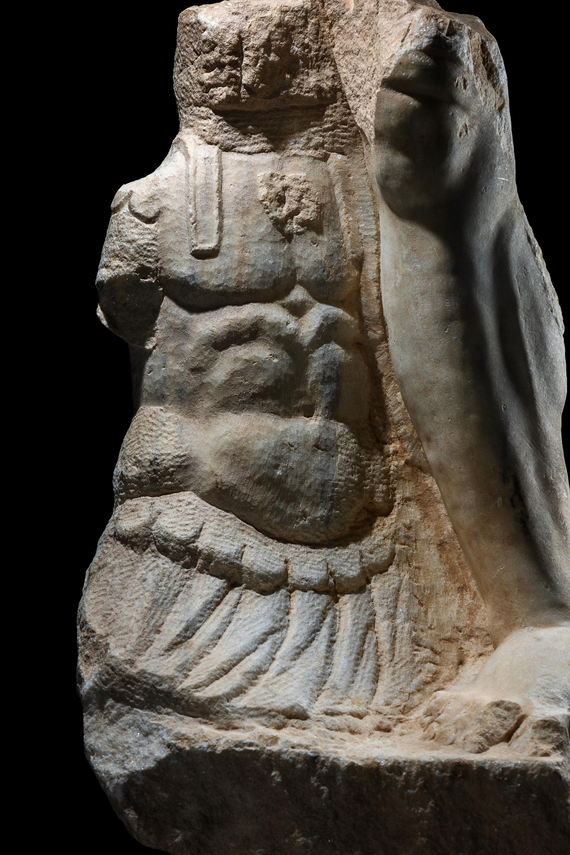 A Roman Marble Fragment from a Monumental Statue of the God Mars