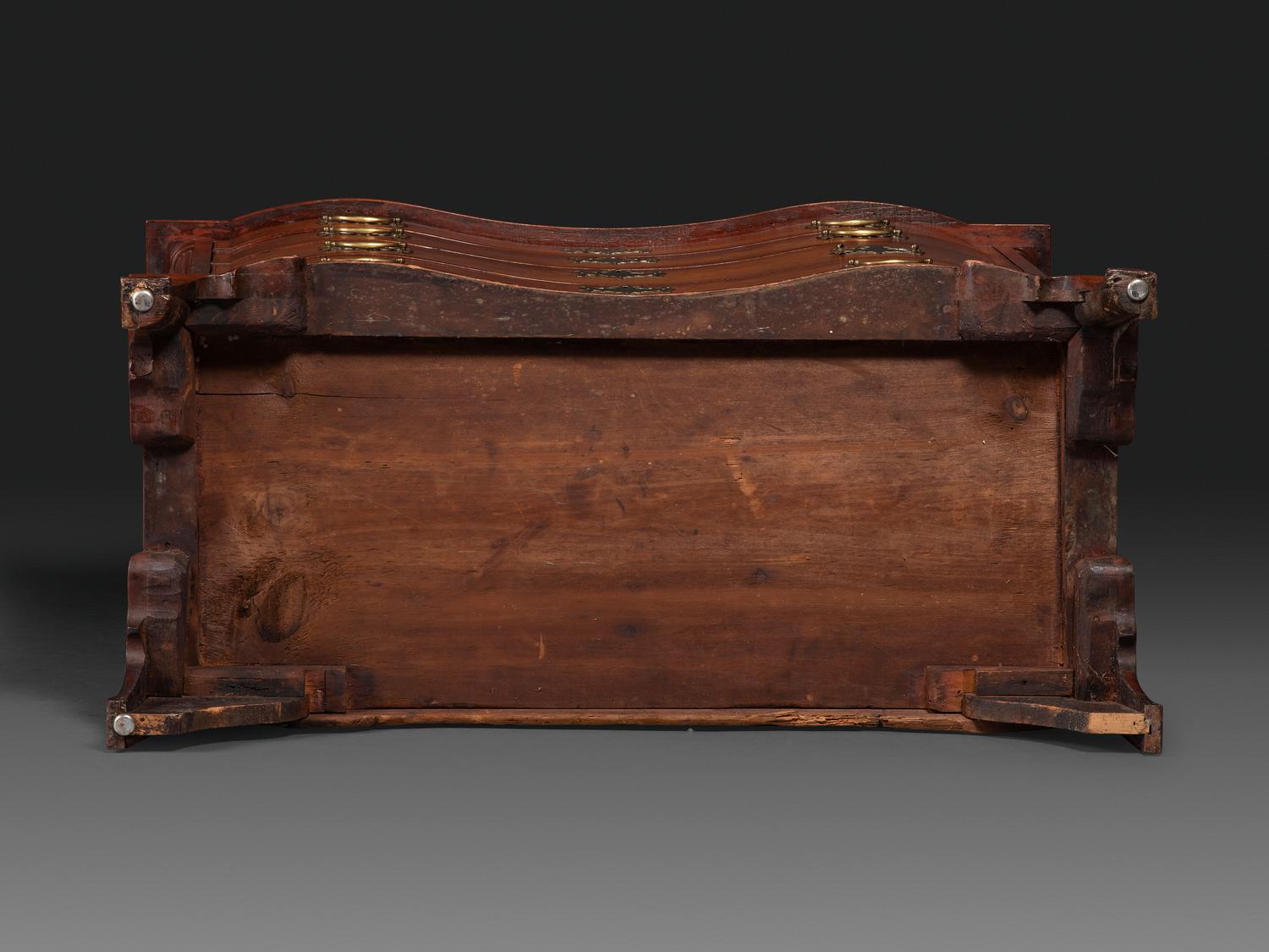 A Chippendale Carved Cherrywood Reverse-Serpentine Chest of Drawers