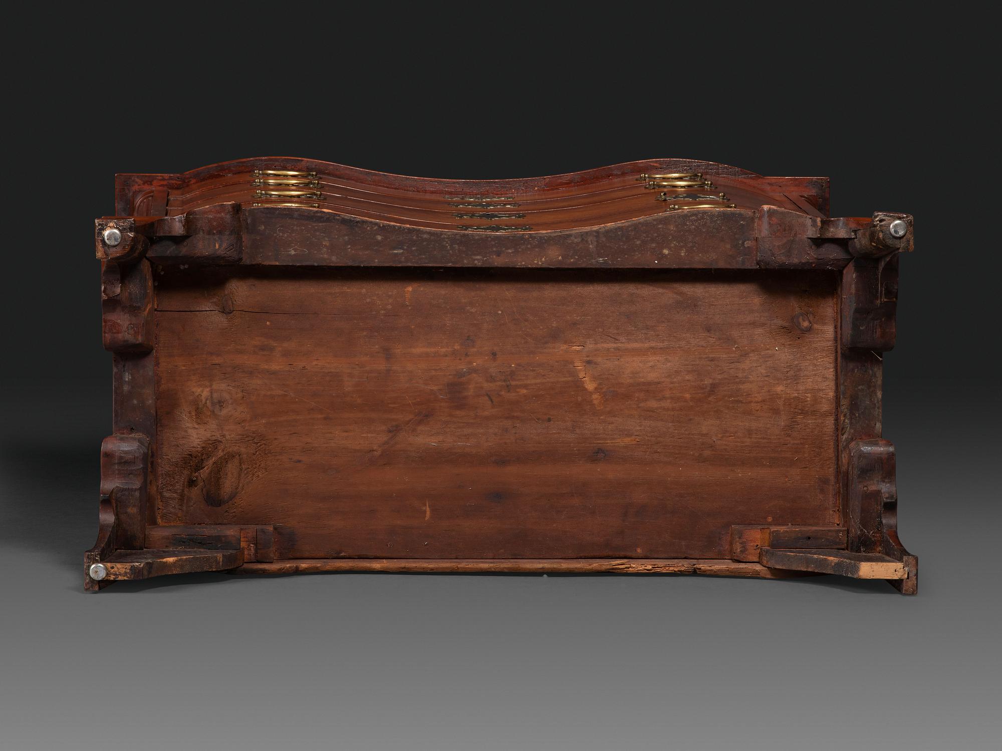 A Chippendale Carved Cherrywood Reverse-Serpentine Chest of Drawers