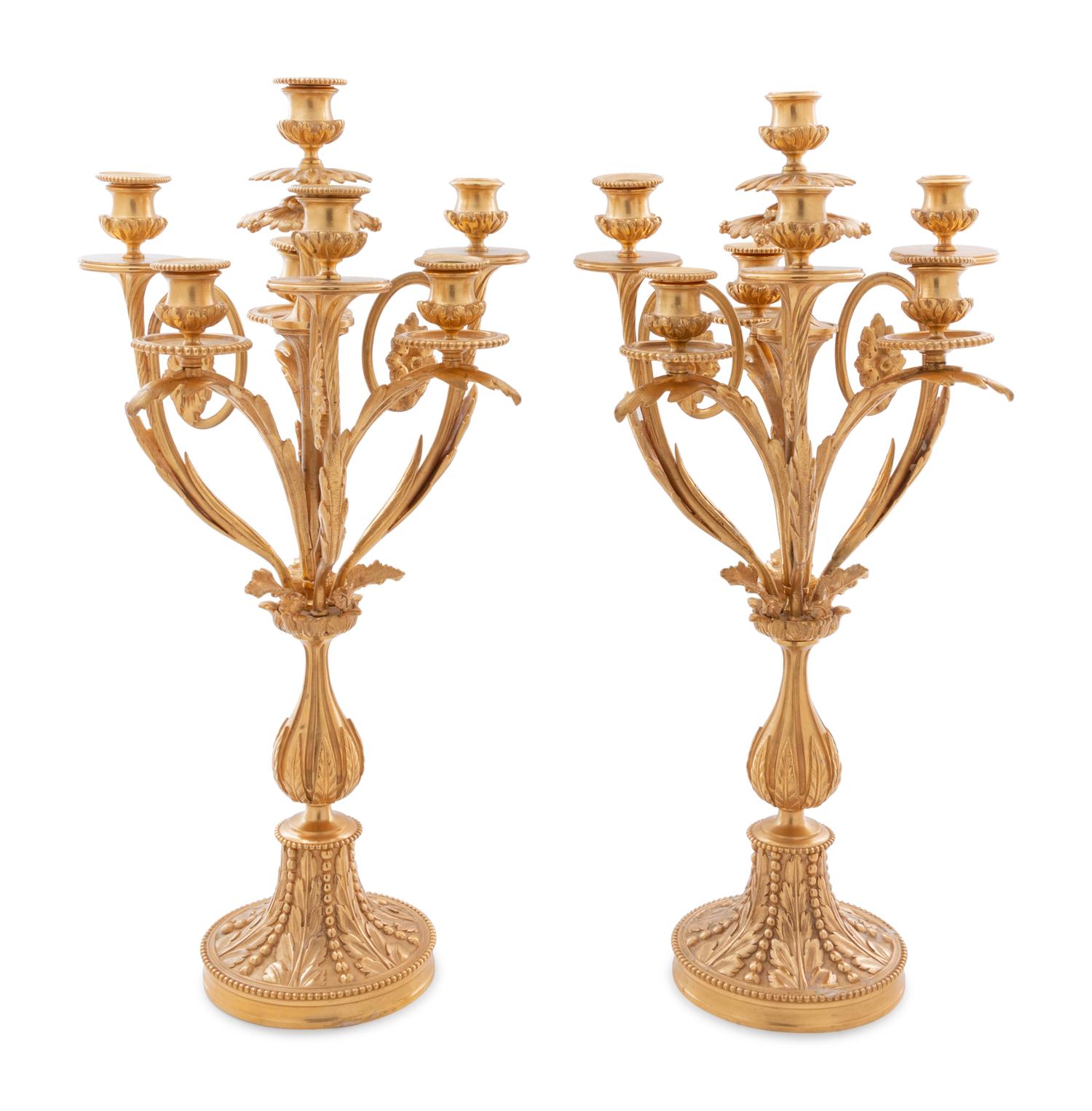 A Louis XV Style Gilt Bronze and Glass Table Garniture