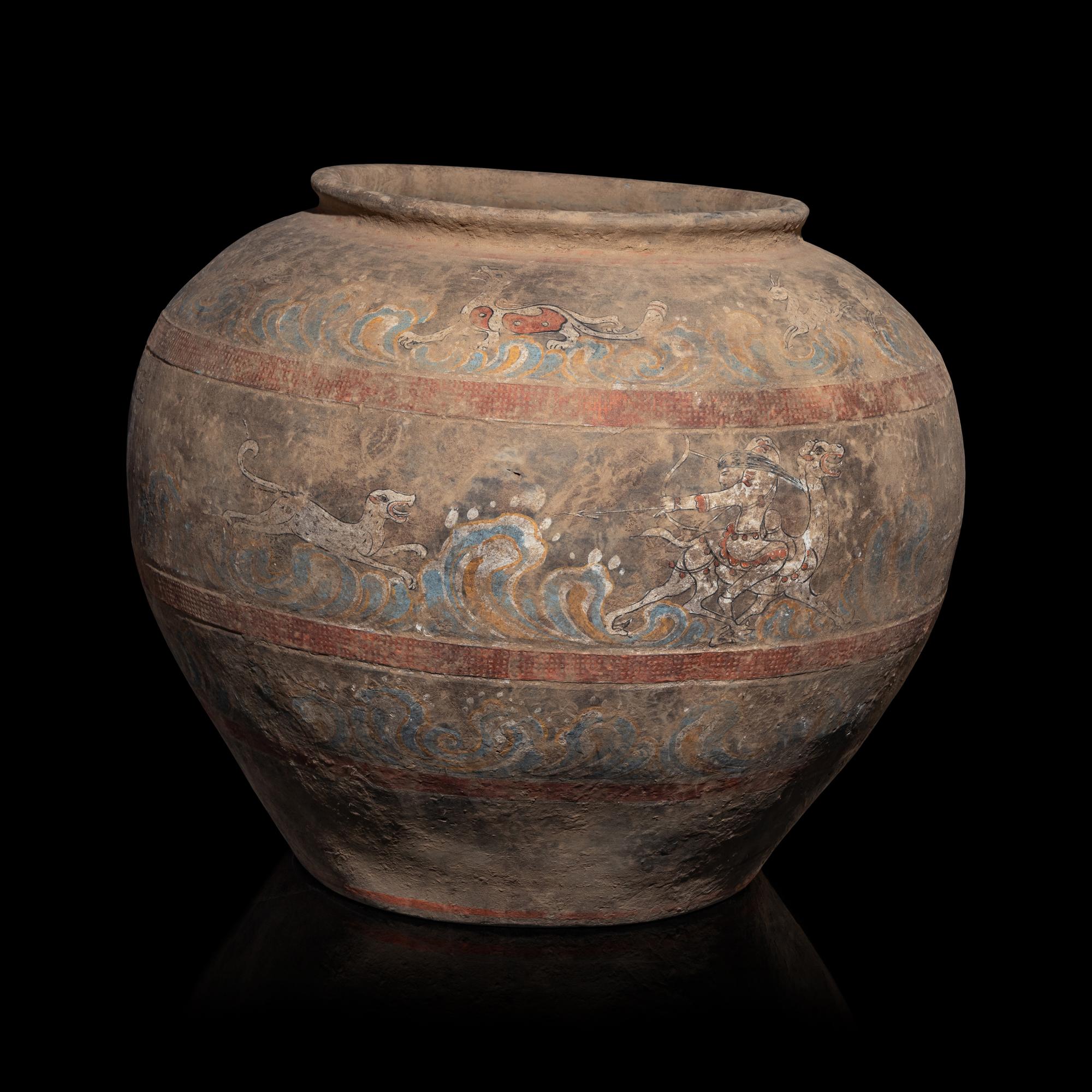 A Chinese Painted Pottery 'Mythical Beast' Jar, Han Dynasty — 漢 灰陶彩繪狩獵圖大罐