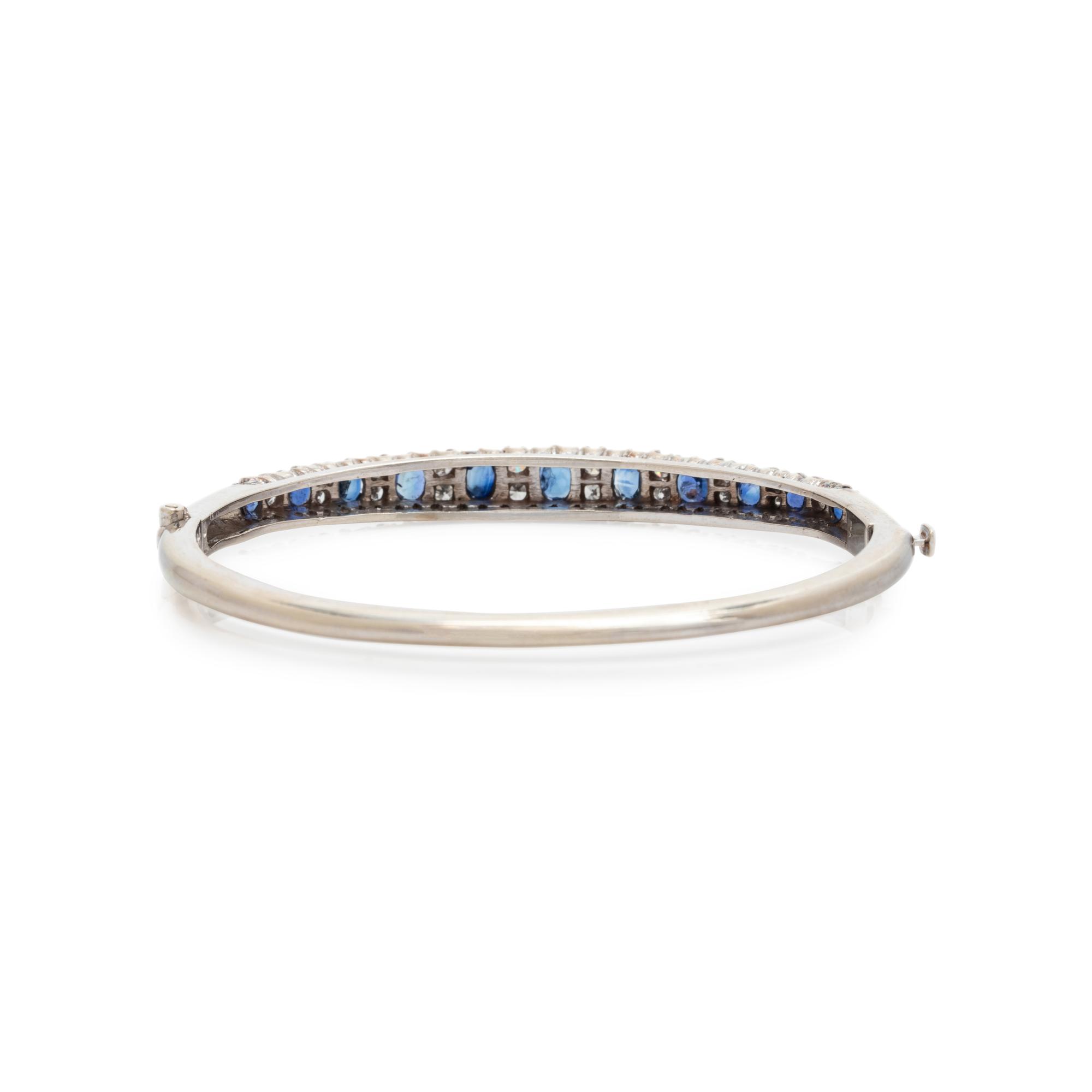 WHITE GOLD, SAPPHIRE AND DIAMOND BANGLE BRACELET