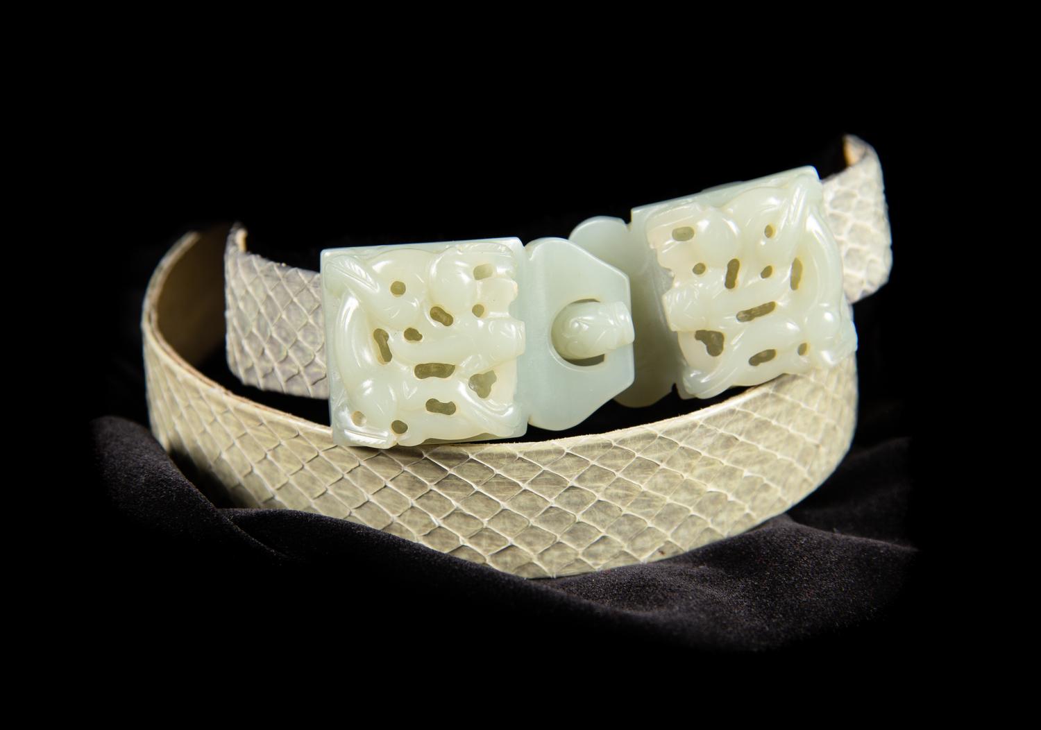 A Celadon Jade Belt Buckle Length 3 1/2 x height 1 1/4 inches. — 19TH CENTURY