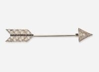 A Platinum, Diamond, and Onyx Jabot Brooch