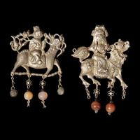 A Group of 10 Assorted Chinese Silver 'Boy and Qilin' Pendants, Late Qing Dynasty-Republic Period 晚清-民國 銀麒麟送子墜瑪瑙長命鎖及其他一組十件