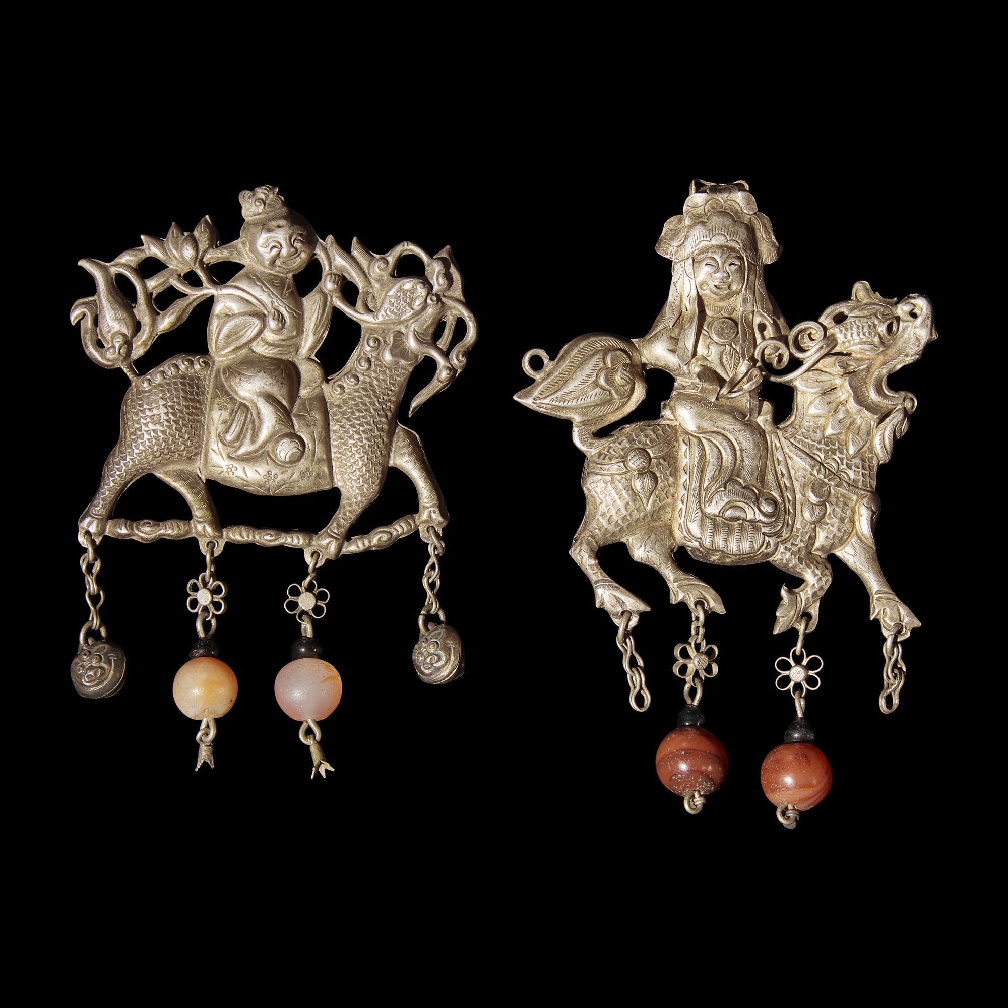 A Group of 10 Assorted Chinese Silver 'Boy and Qilin' Pendants, Late Qing Dynasty-Republic Period 晚清-民國 銀麒麟送子墜瑪瑙長命鎖及其他一組十件