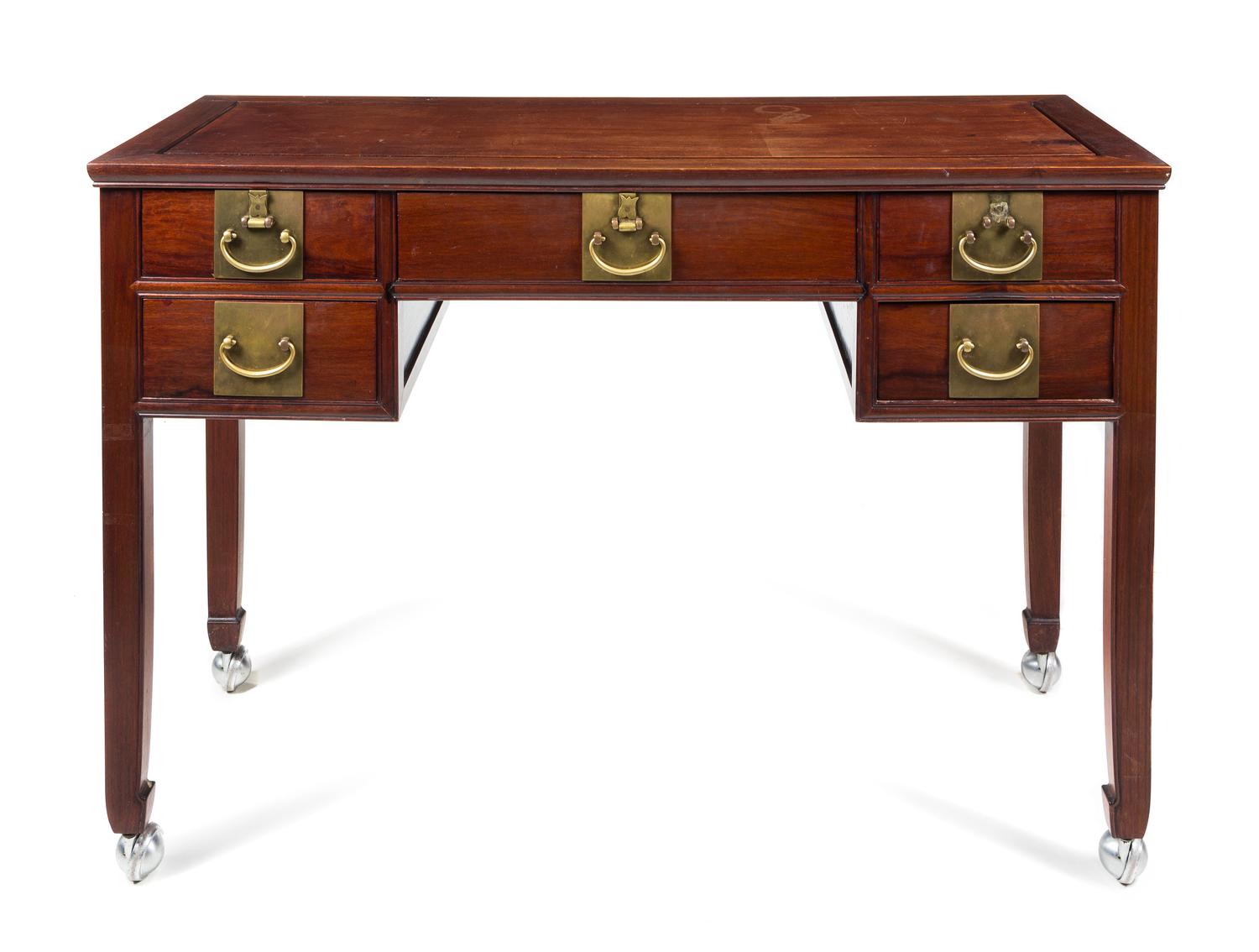 A Chinese Hardwood Writing Desk Height 33 3/4 x width 48 x depth 24 inches.