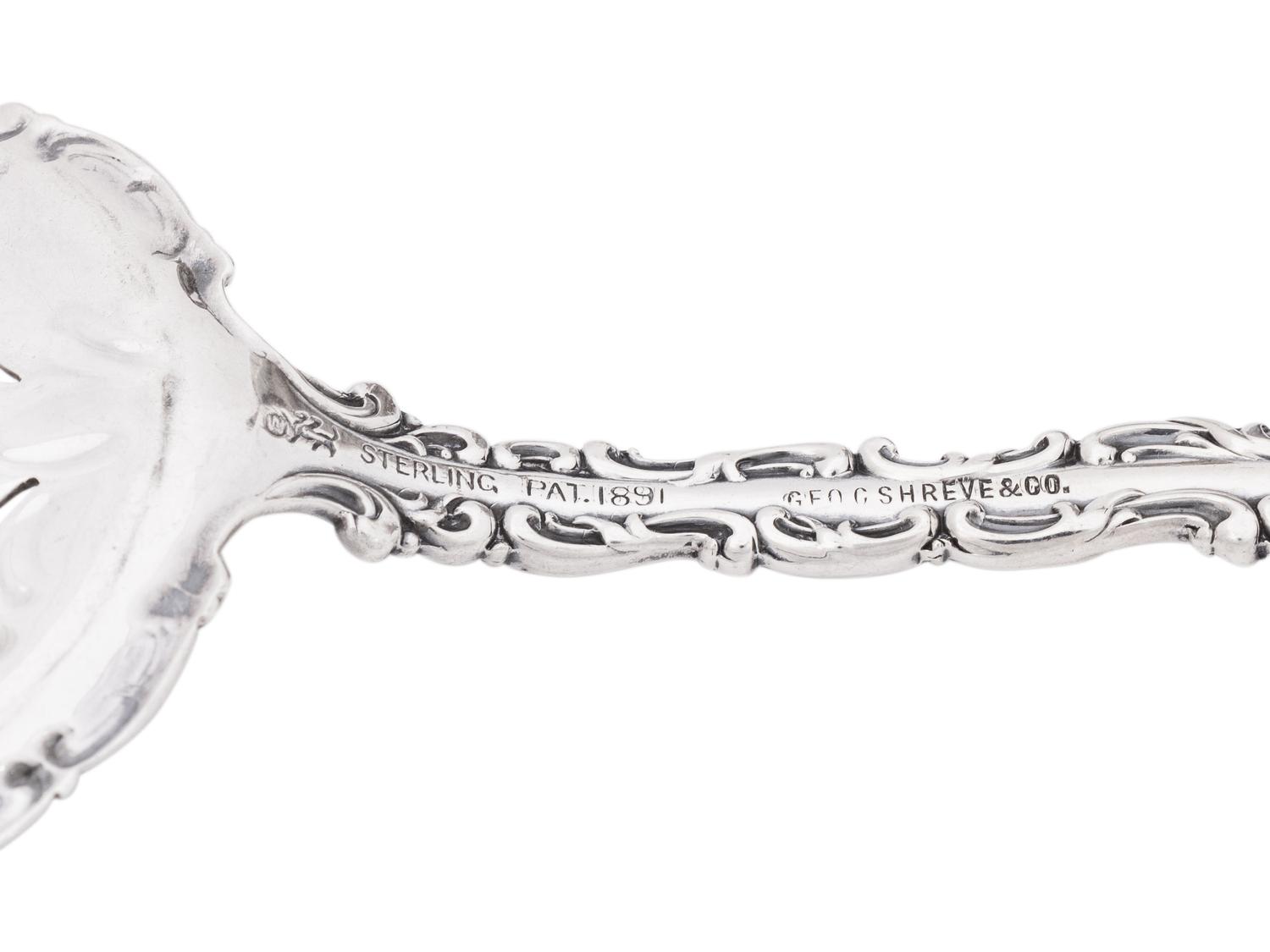 A George III Silver Sauce Boat and Serving Spoon
