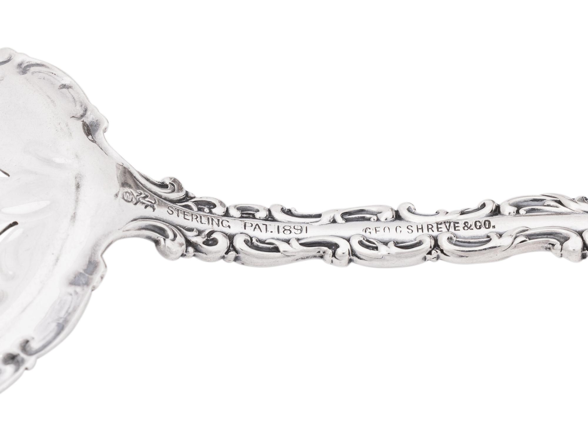 A George III Silver Sauce Boat and Serving Spoon