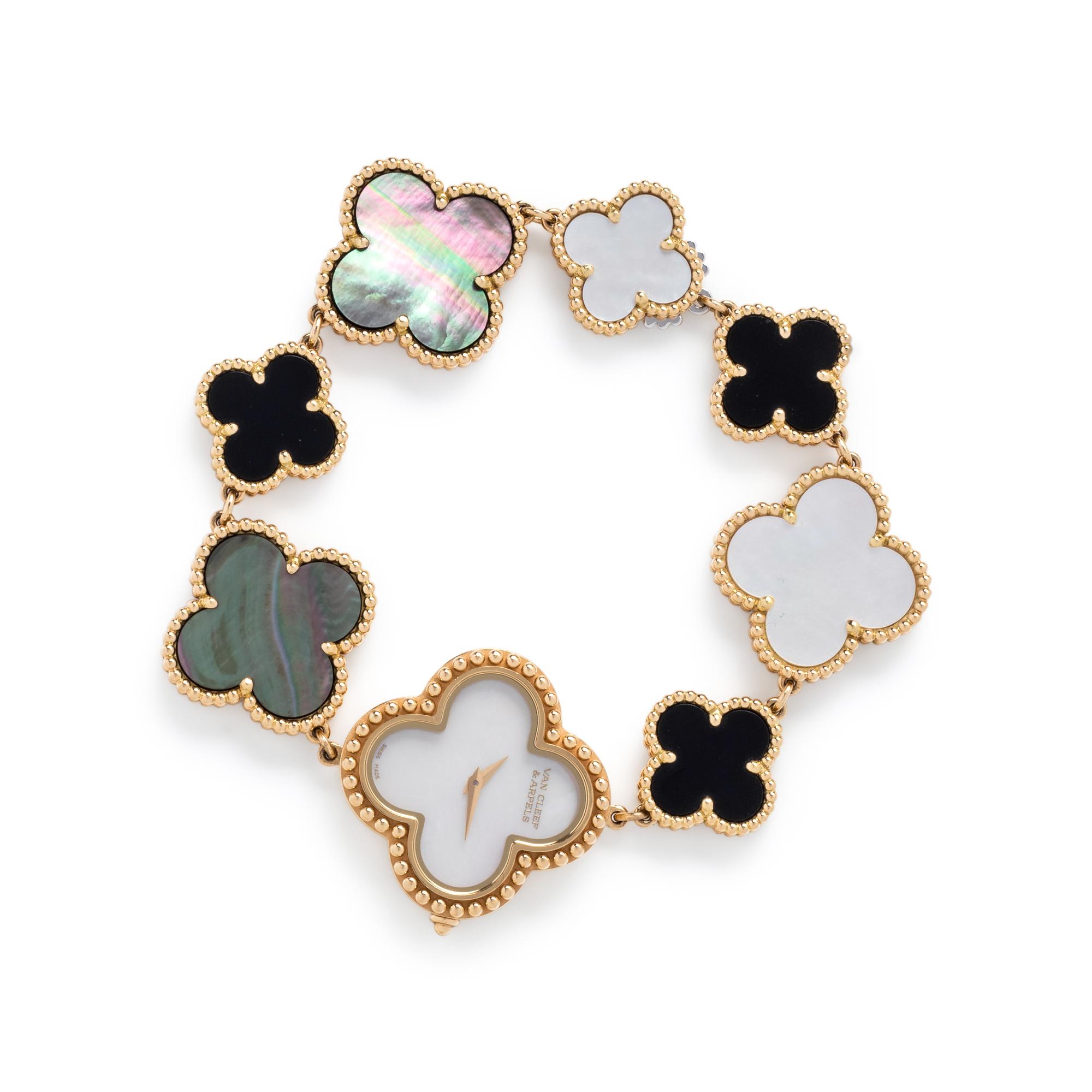 VAN CLEEF & ARPELS, MOTHER-OF-PEARL AND ONYX 'ALHAMBRA' WRISTWATCH