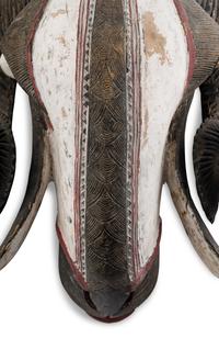 An African Carved and Painted Wood Ram's Head
