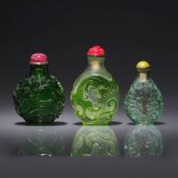 Three Chinese Carved Green Glass Snuff Bottles 綠料鼻烟壺三支
