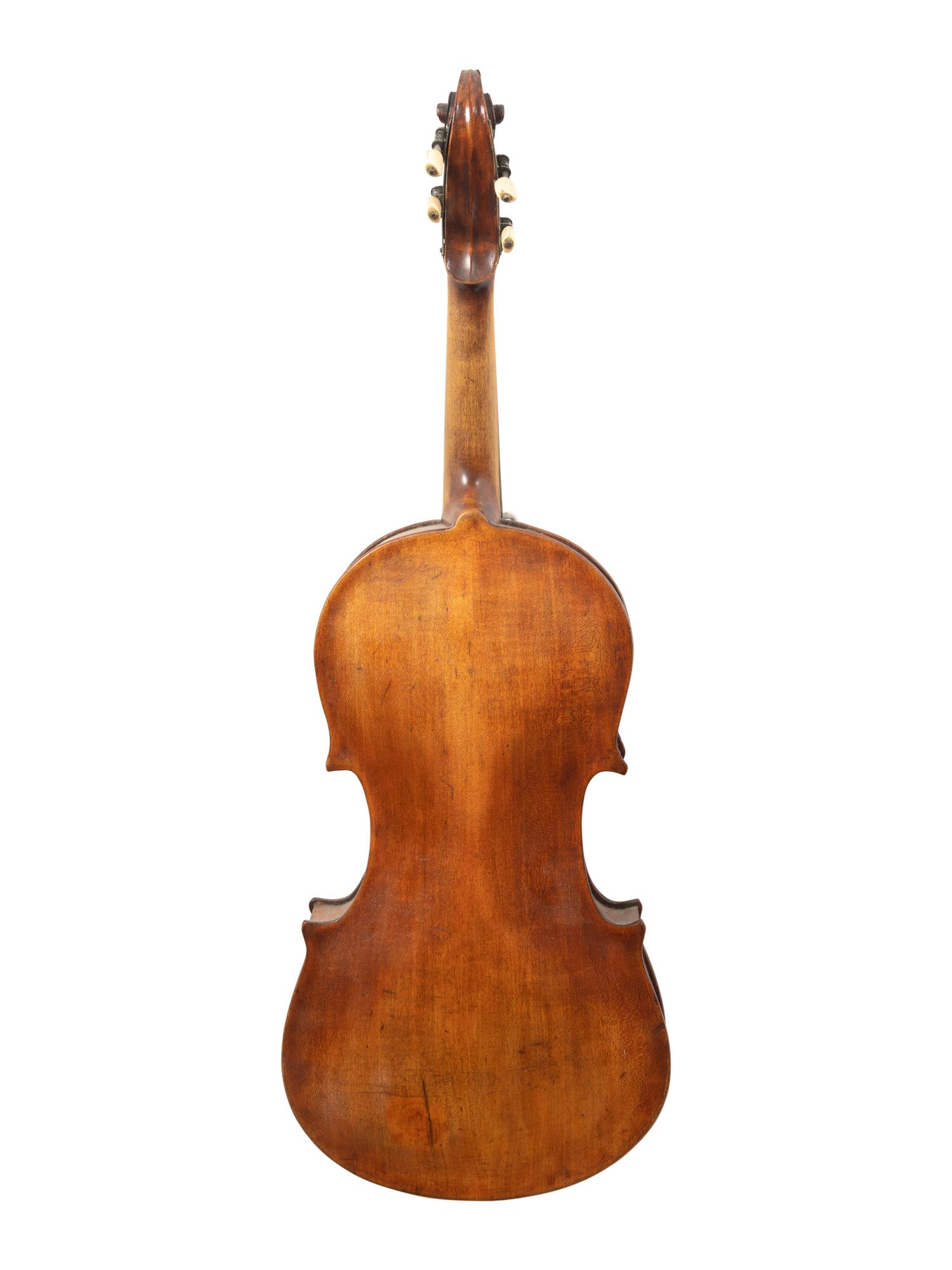 A Carved Pine Violin