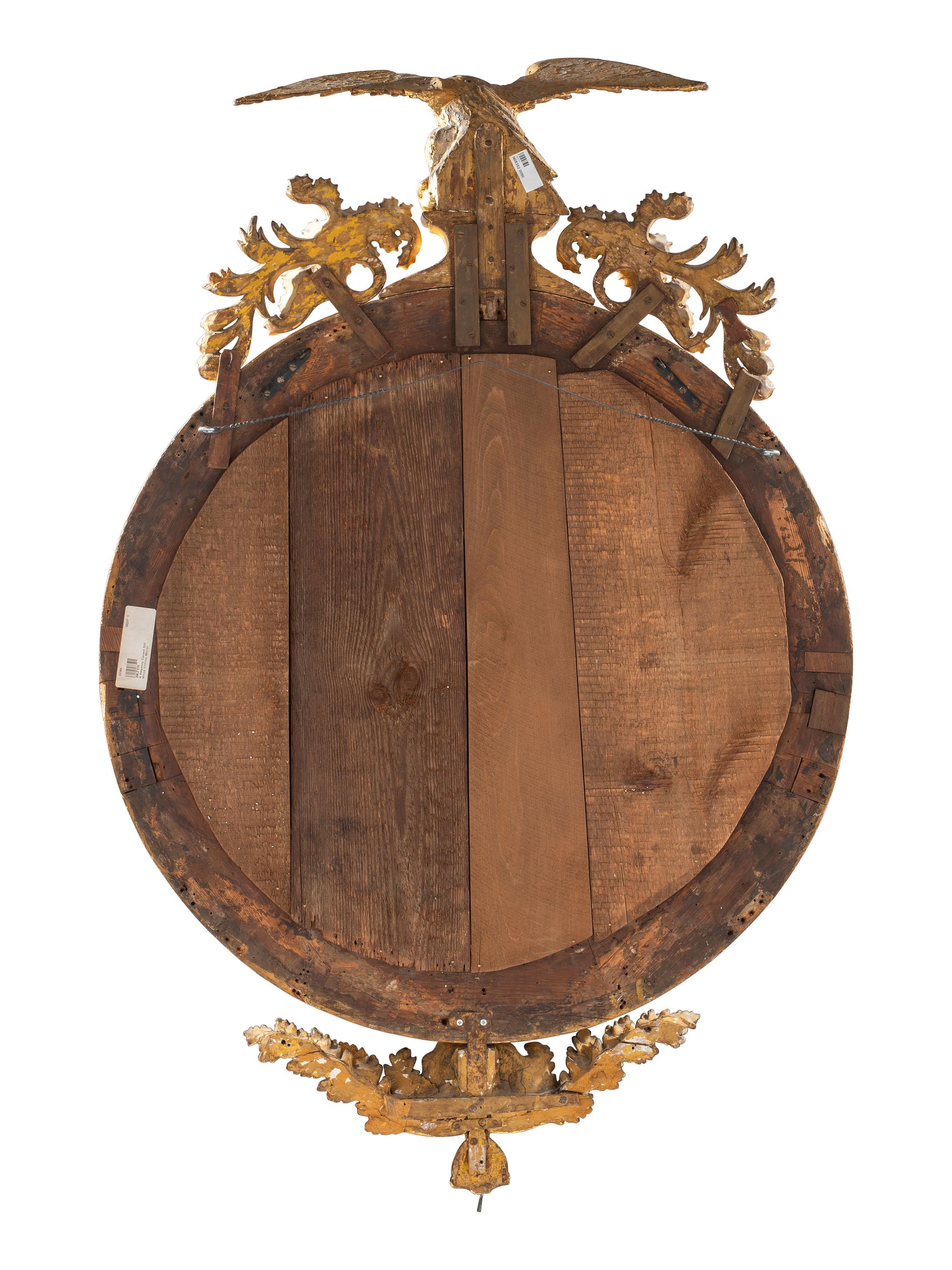 A Large Federal Carved Giltwood and Gesso Bull's-Eye Looking Glass