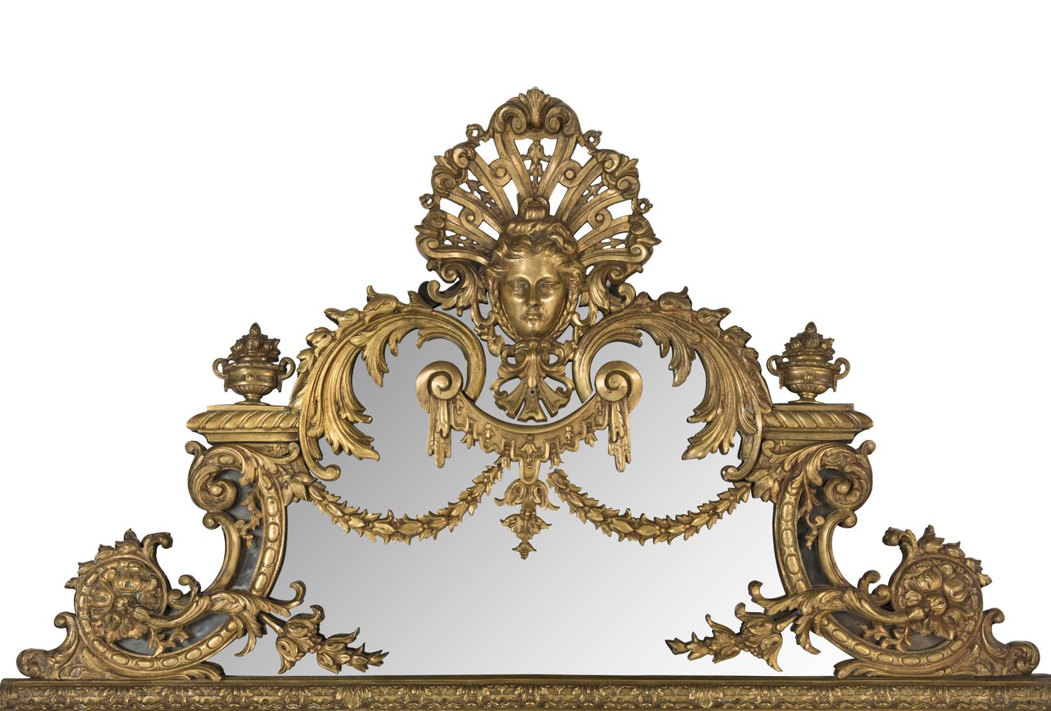 A Louis XIV Style Gilt Bronze Mounted and Ebonized Mirror