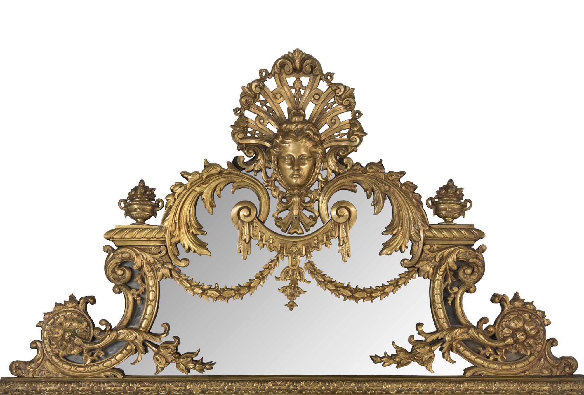 A Louis XIV Style Gilt Bronze Mounted and Ebonized Mirror
