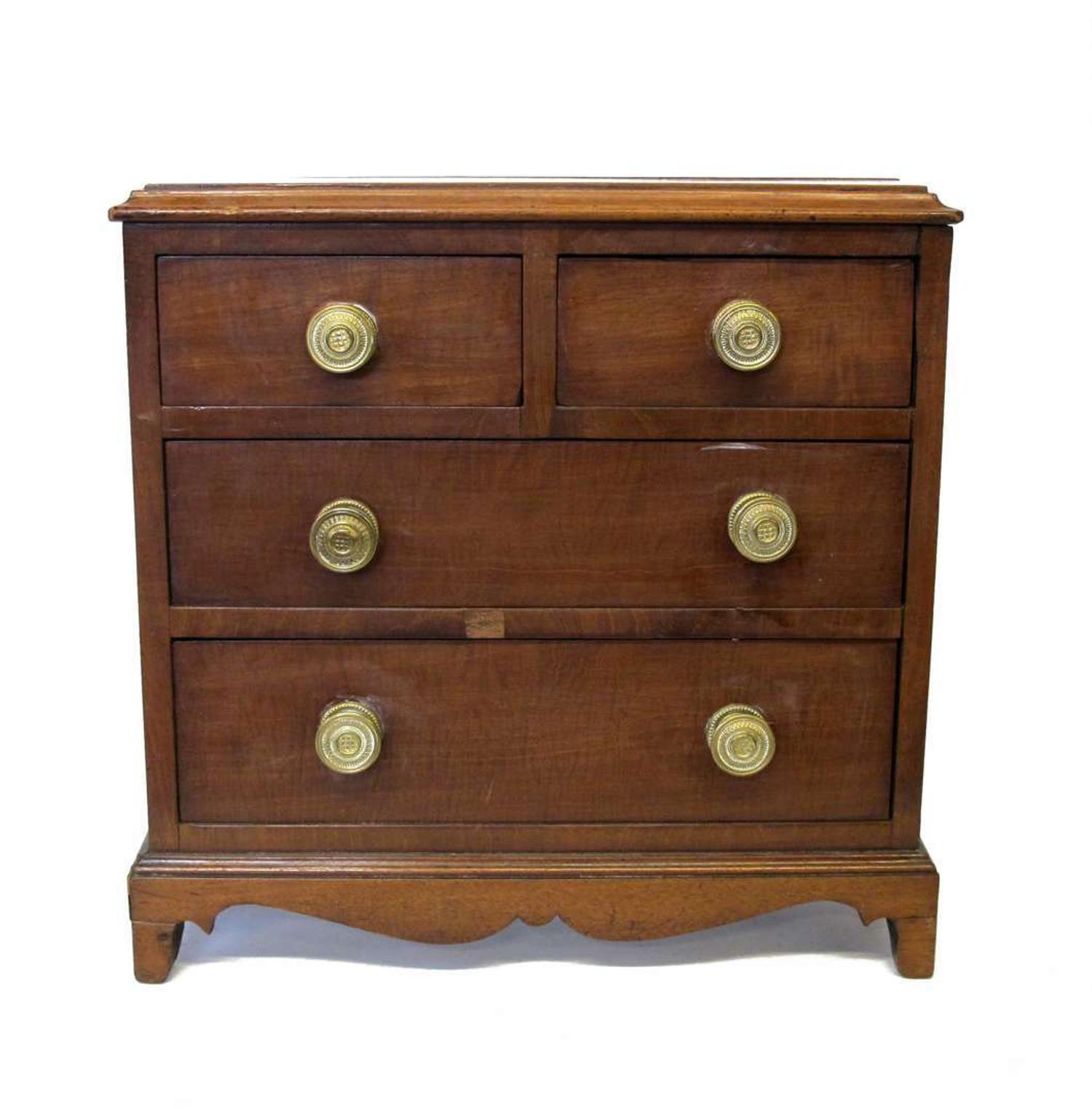 Miniature walnut four drawer chest early 19th century