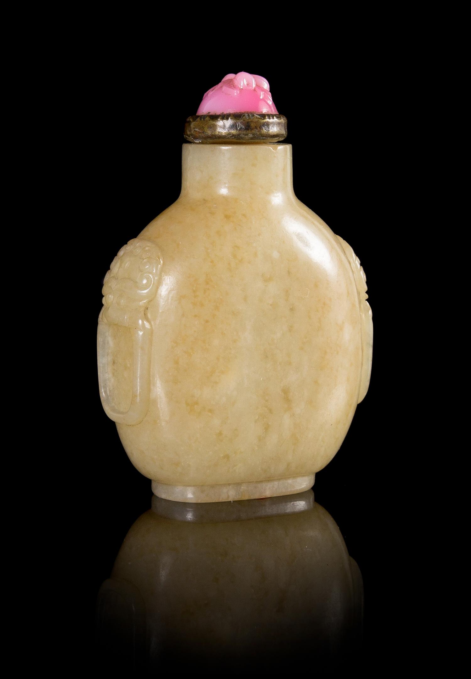 A Mottled Yellow Jade Snuff Bottle Height 3 1/8 inches.