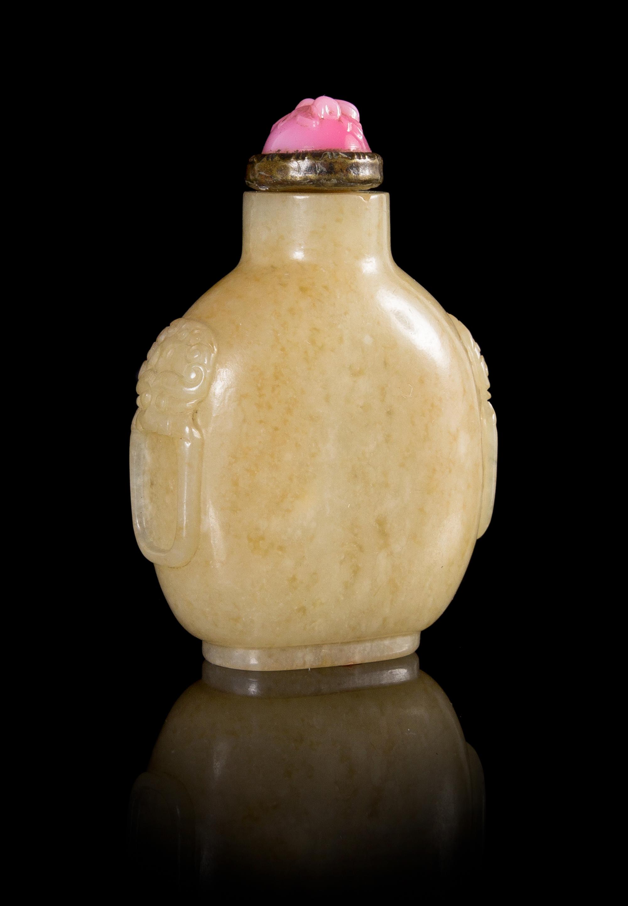 A Mottled Yellow Jade Snuff Bottle Height 3 1/8 inches.