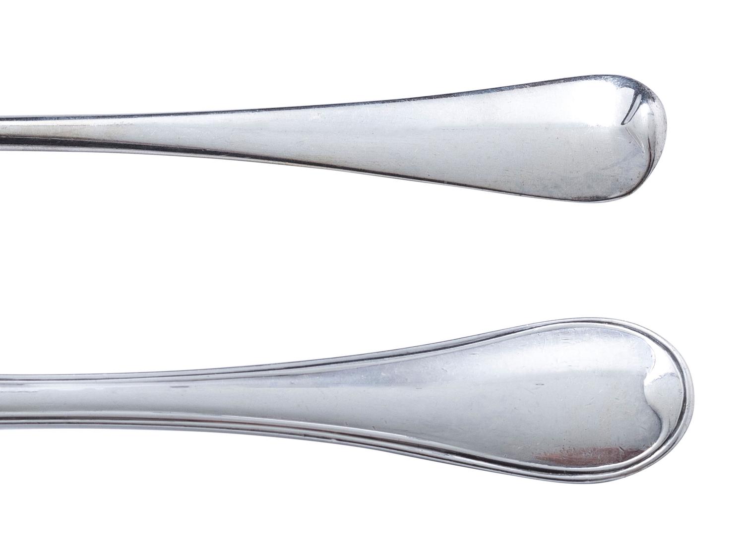 Twenty Four English Silver Forks and Twenty Four French Silver Spoons
