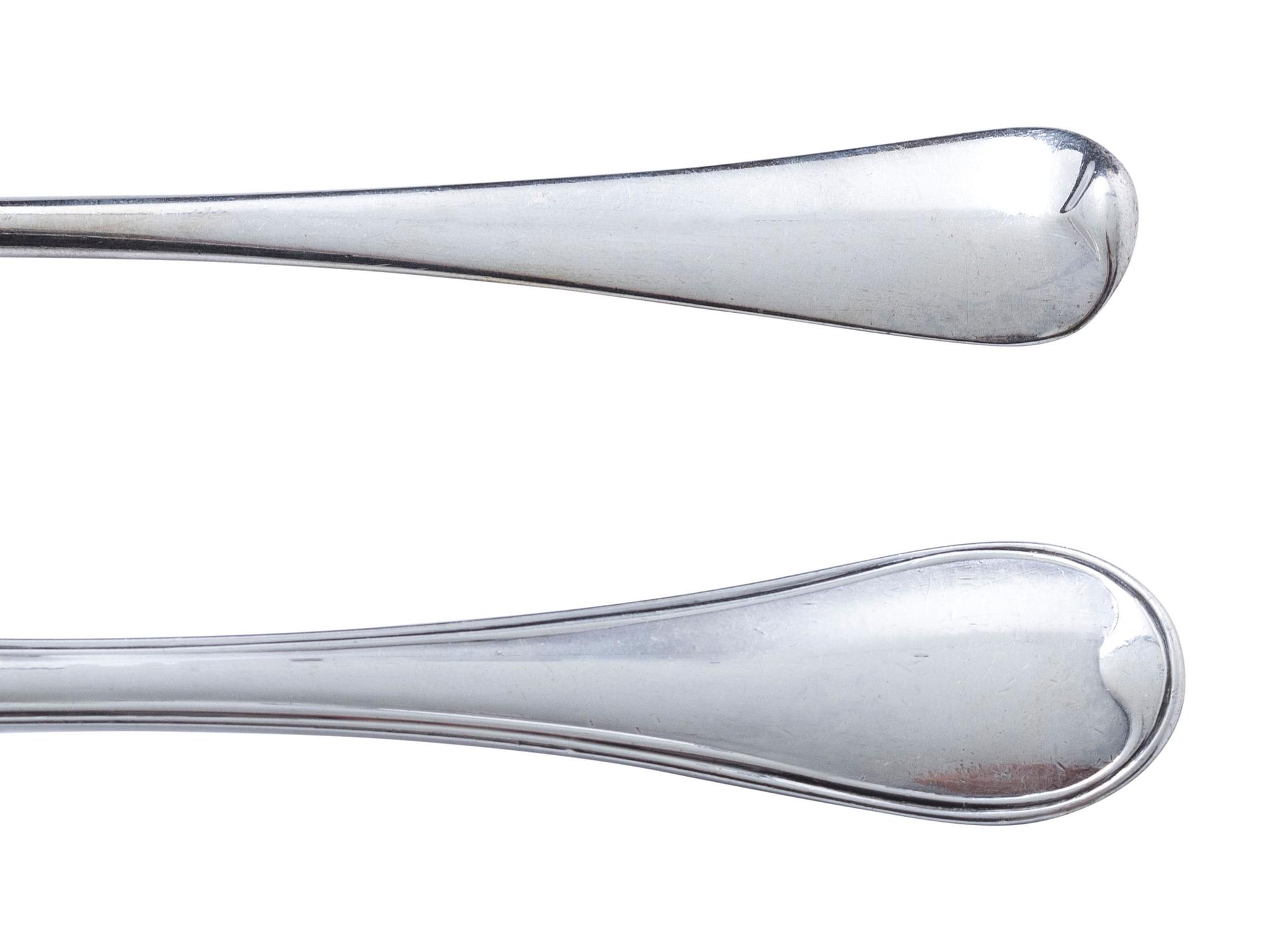 Twenty Four English Silver Forks and Twenty Four French Silver Spoons