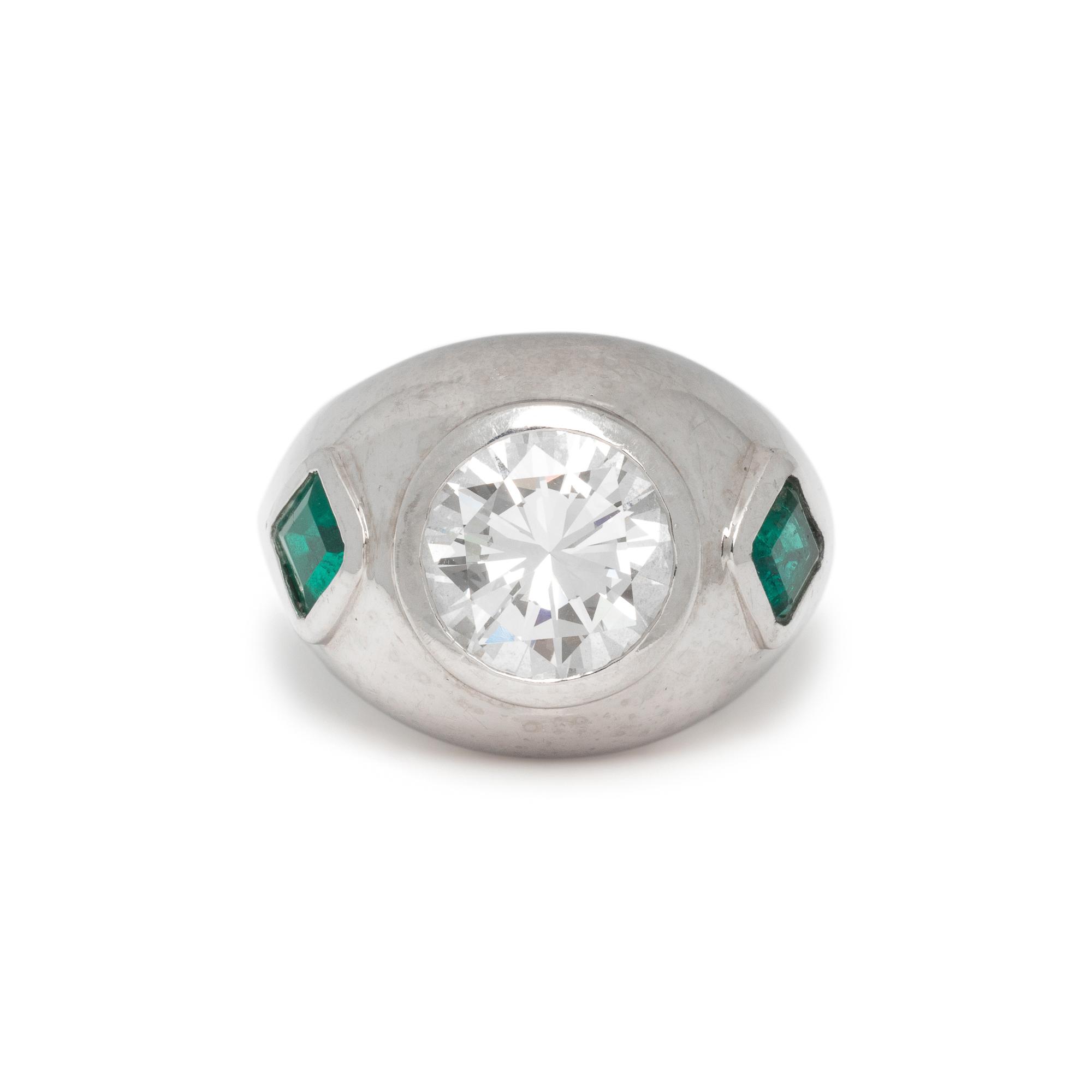 PLATINUM, DIAMOND AND EMERALD RING