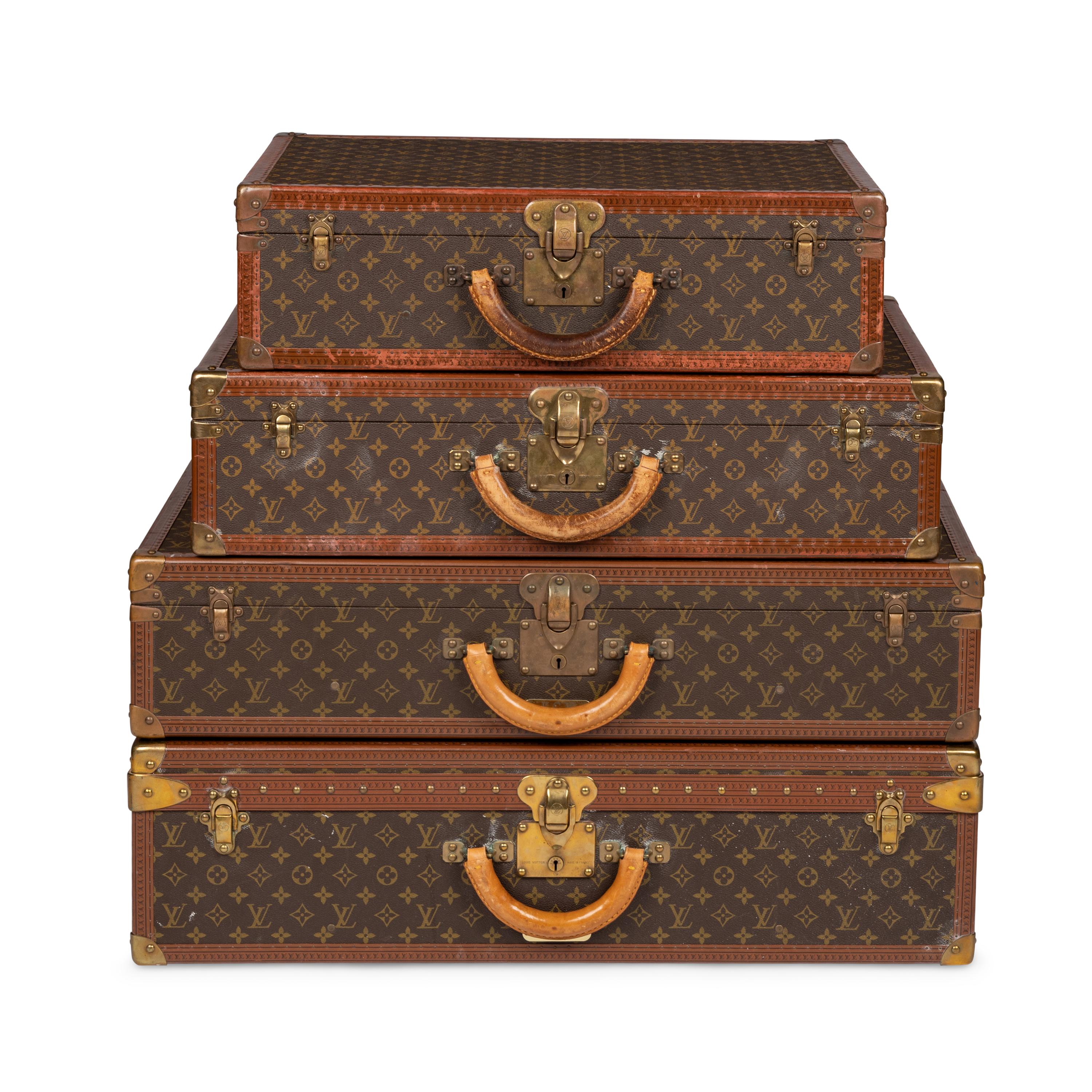 Louis Vuitton, Group of Four Hard-sided Suitcases