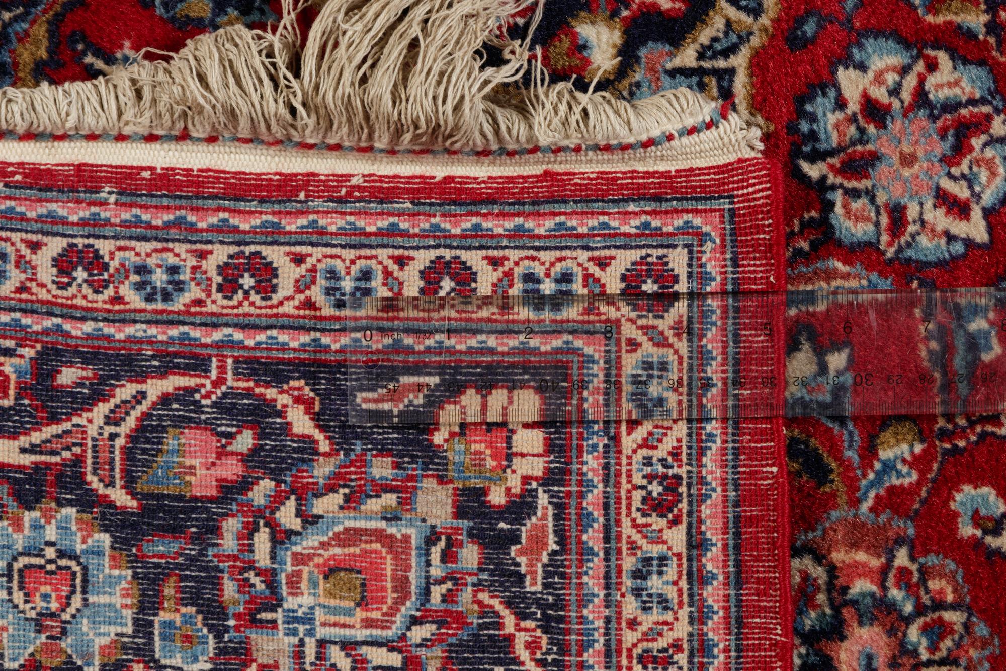 A Kashan Wool Rug