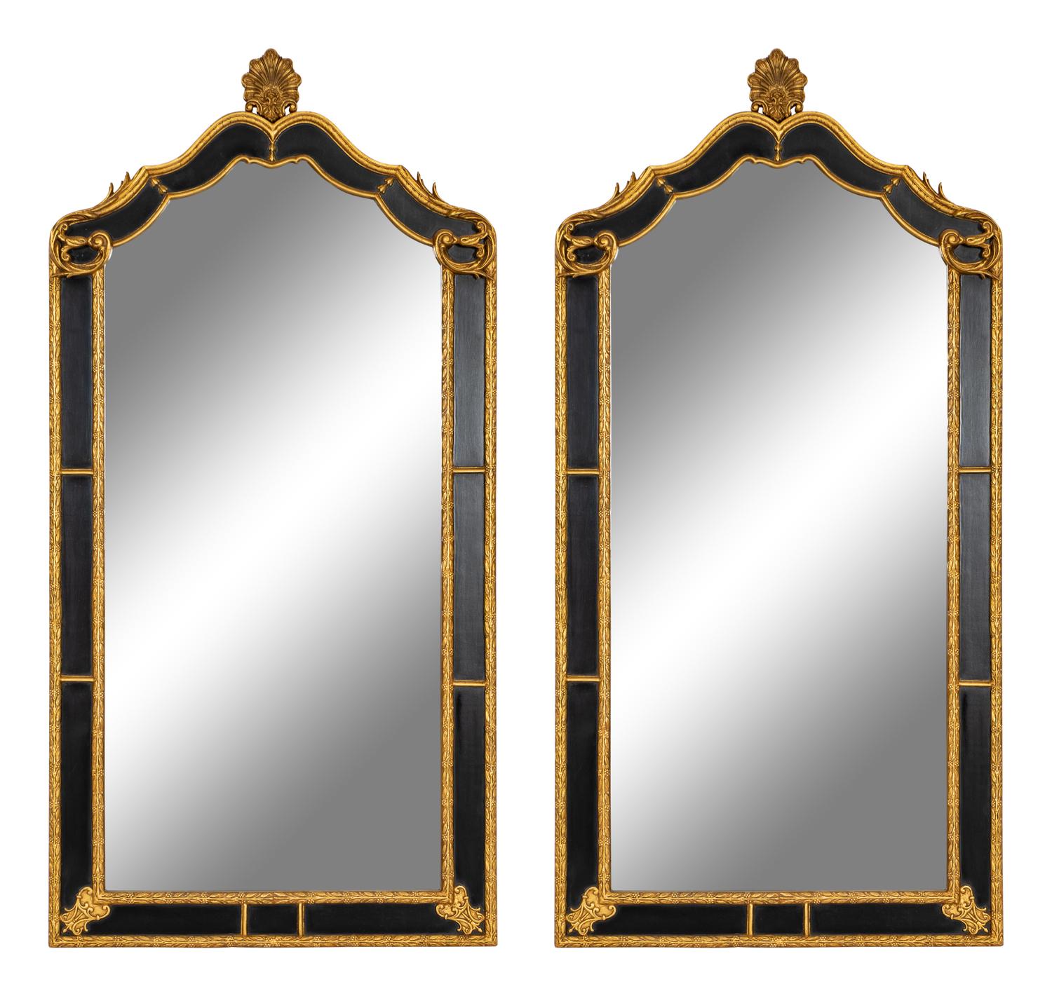 A Pair of Large Ebonized and Parcel Gilt Pier Mirrors