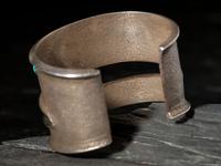 Tufa Cast Silver Cuff Bracelet, with Inlaid Abstract Figural Design