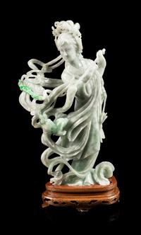 A Chinese Apple Green and Pale Celadon Jadeite Figure of a Female Immortal