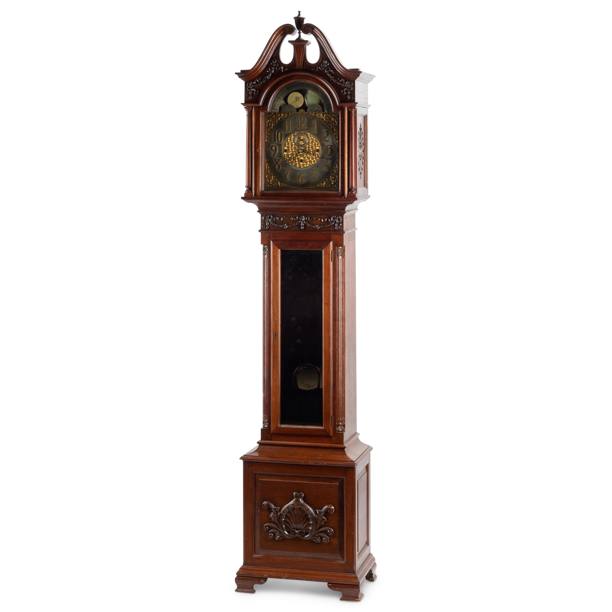 An English Carved Mahogany Tall Case Clock