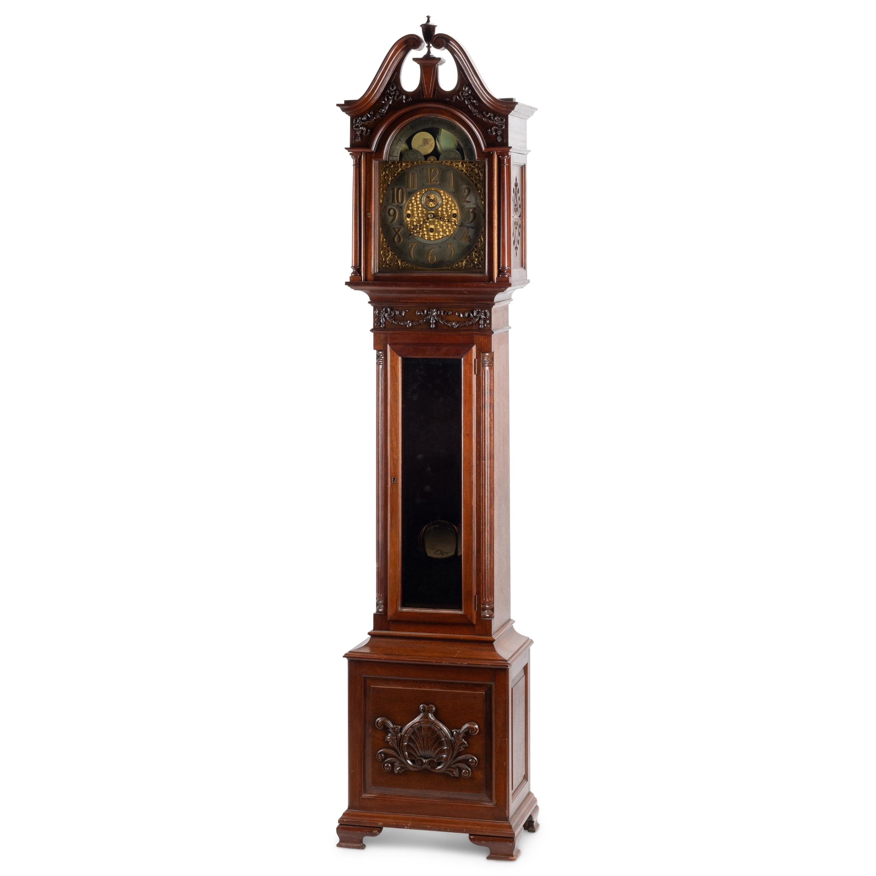 An English Carved Mahogany Tall Case Clock