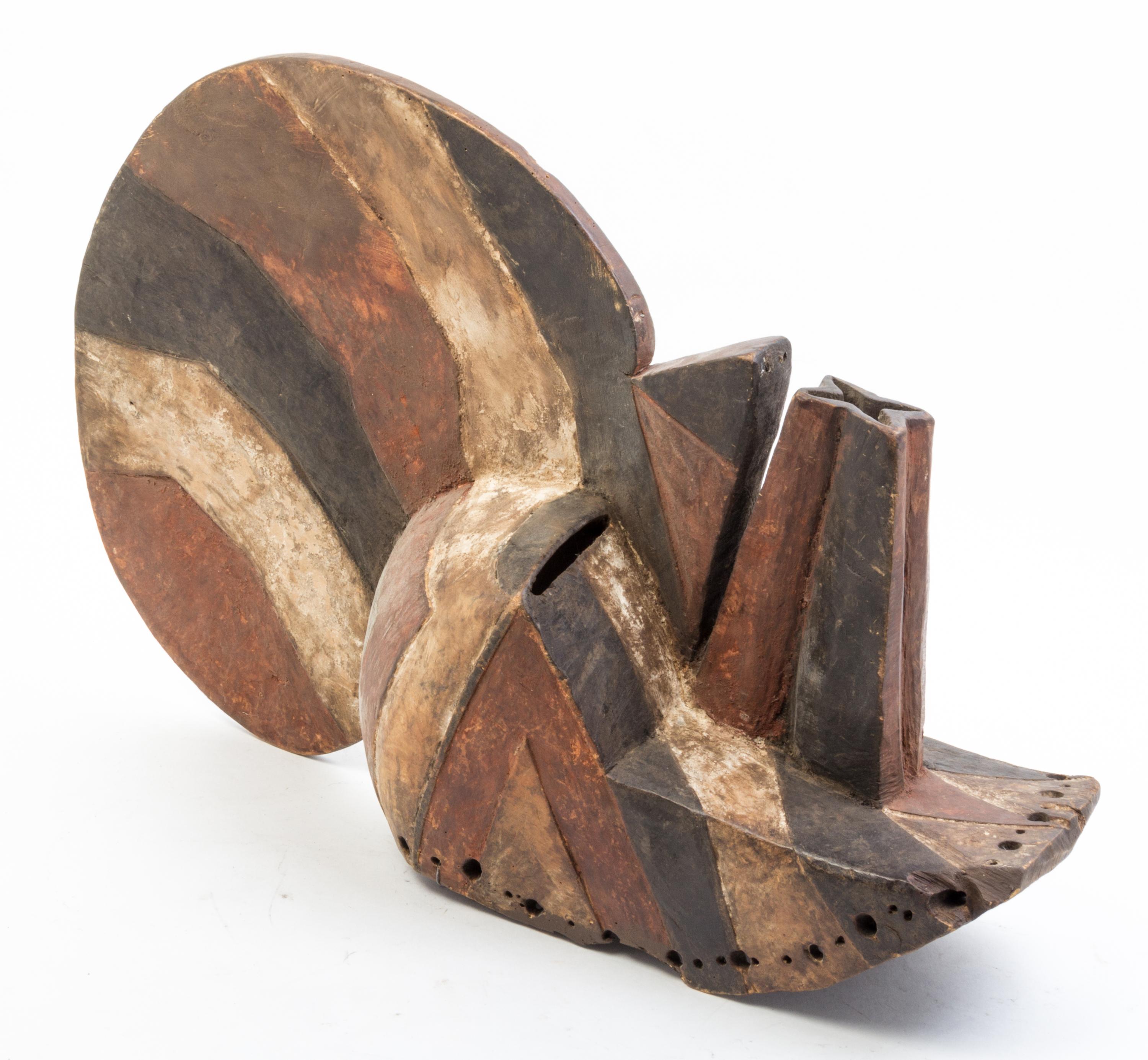 Two Ugandan Wood Busts or Masks Height of larger 25 inches.