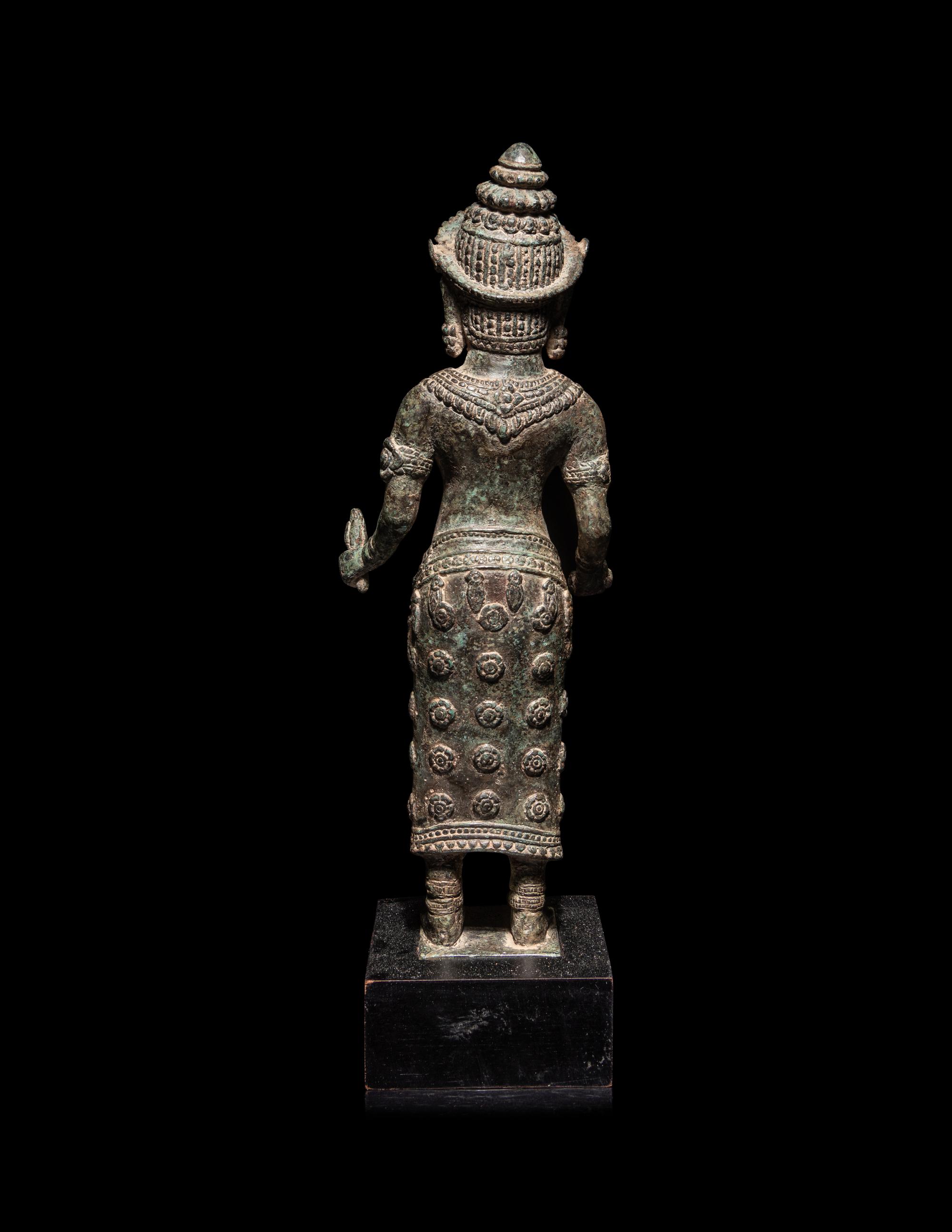 A Khmer Bronze Figure of a Deity