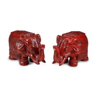 A Pair of Chinese Carved Red Lacquer Elephant Stools