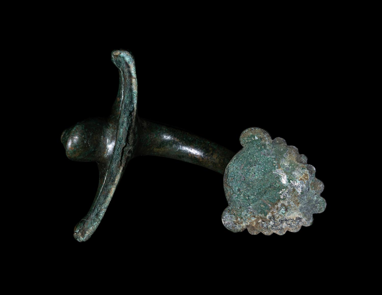 A Greek Bronze Hydria Handle