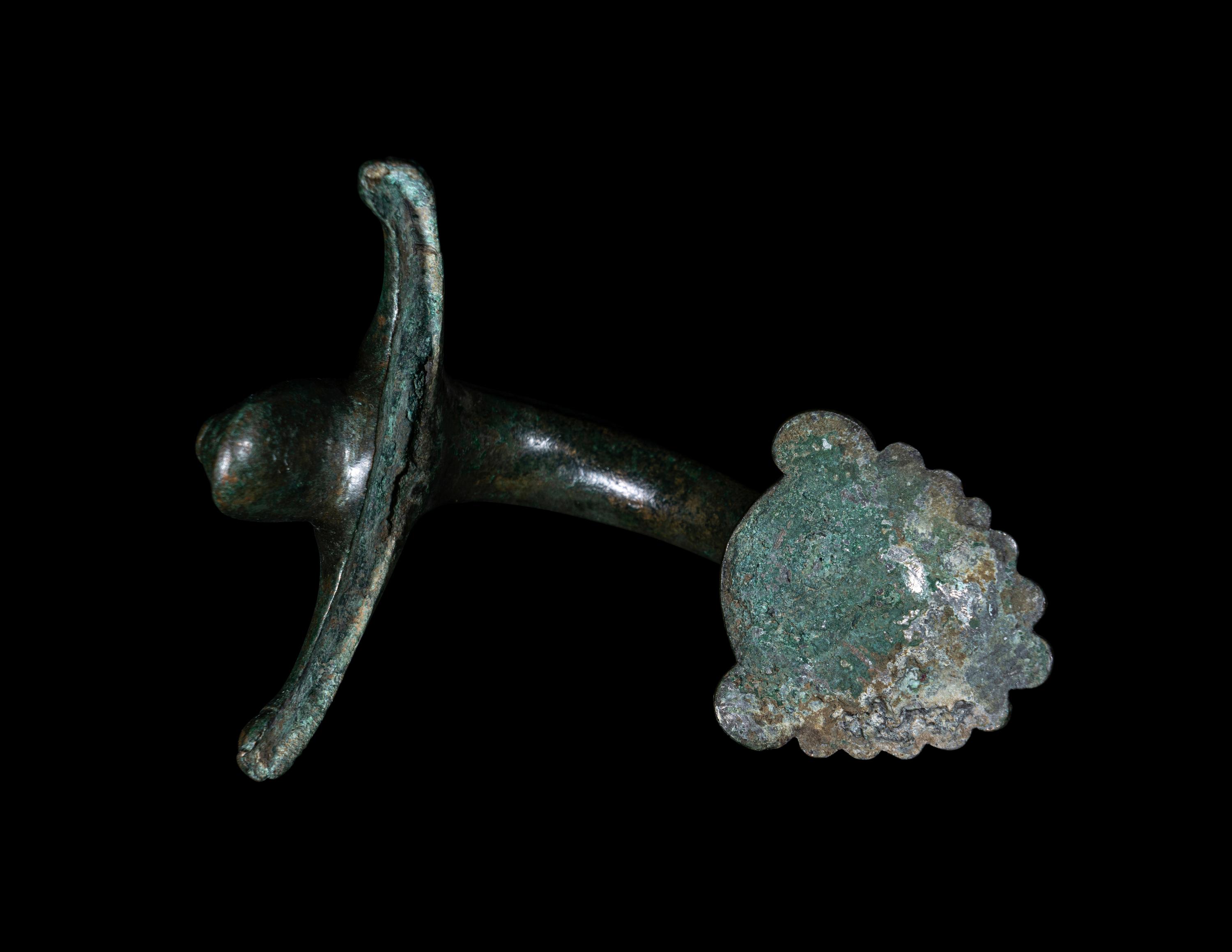 A Greek Bronze Hydria Handle