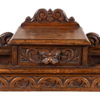 An English Renaissance Revival Carved Oak Umbrella Stand