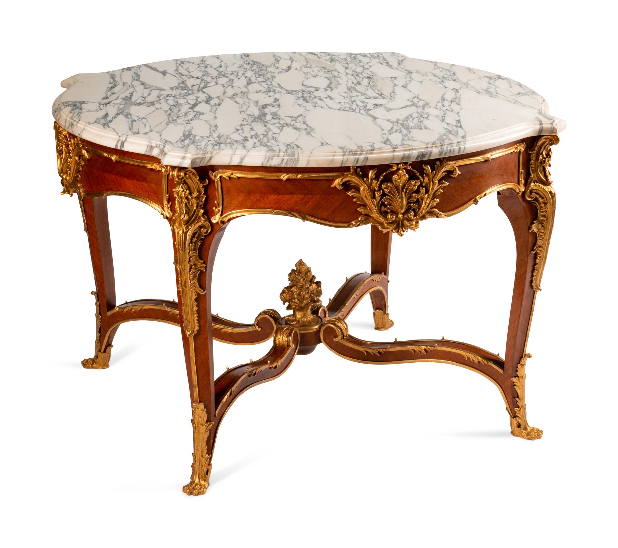 A Louis XV Style Gilt-Bronze-Mounted Kingwood Table de Milieu