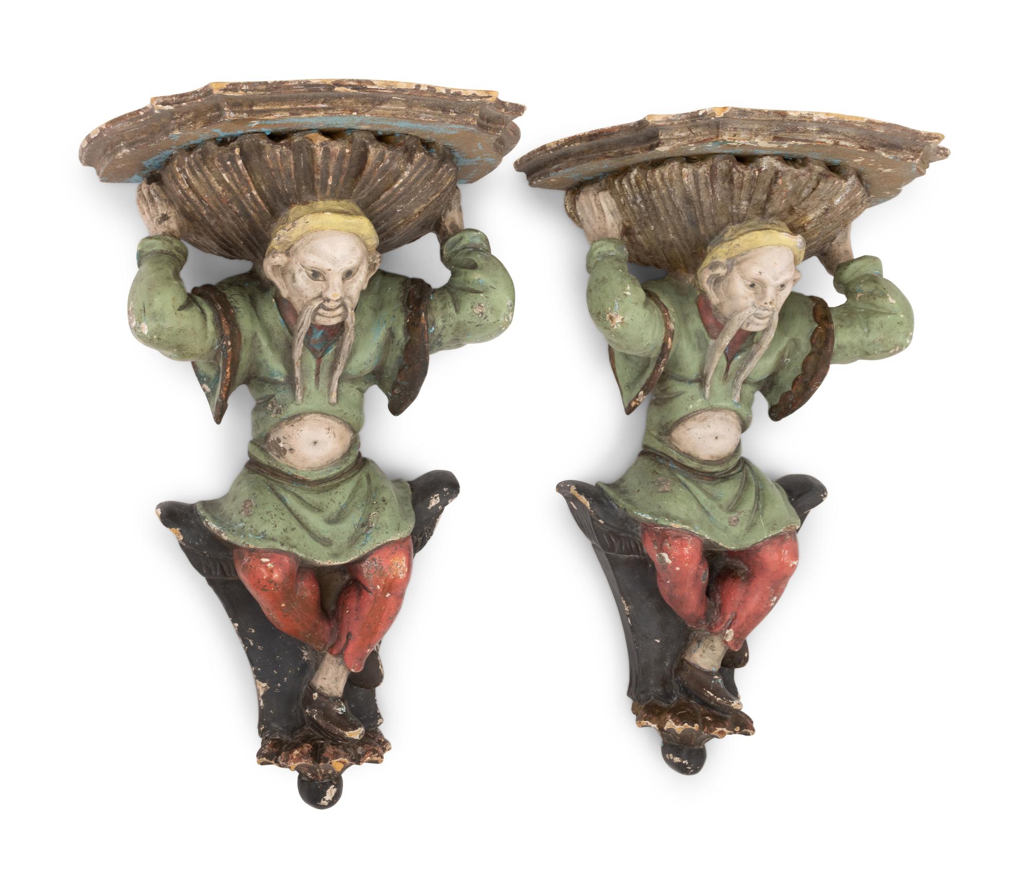 A Pair of Italian Carved and Polychrome Decorated Wood Figural Wall Brackets