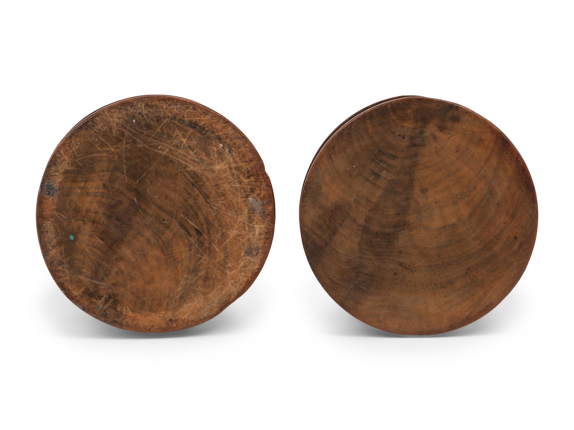 A Pair of French Olivewood "Pique Cierge" Candlesticks