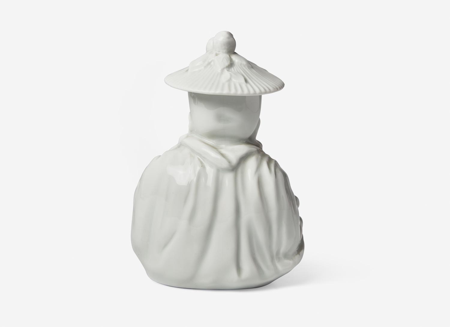 Two Pairs of Chinese Porcelain Figures of Parrots and A Chinese Style White Glazed Porcelain 'Pagoda' Figure